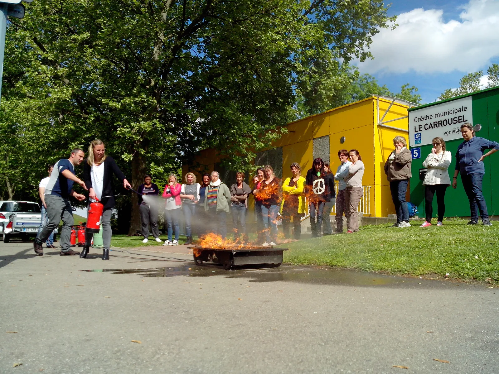 Équipe participant à un exercice réel de formation incendie Alertis